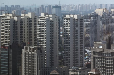 Factbox-China pledges $138 billion in extra funding to shore up indebted property sector