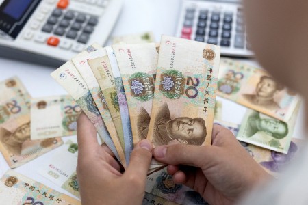 Analysis-Cash is leaving China again, pressuring yuan