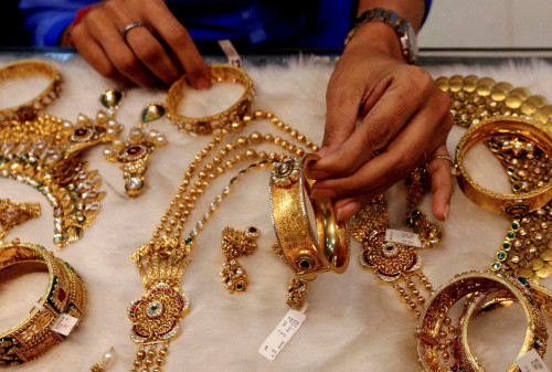Gold’s lustre undimmed, prices hit records above $3,300/oz