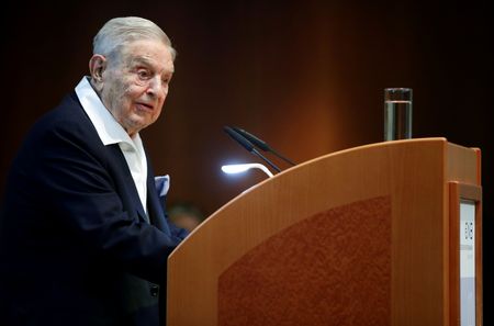 Billionaire George Soros hands control of empire to son Alex