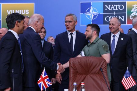 NATO allies offer Ukraine security assurances as Biden hits out at ‘craven’ Putin